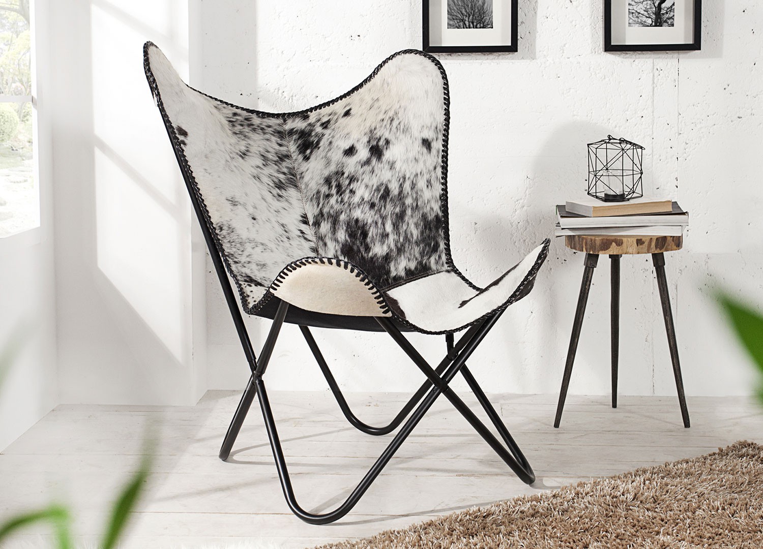 Chaise papillon retro lounge noir et blanc en cuir véritable
