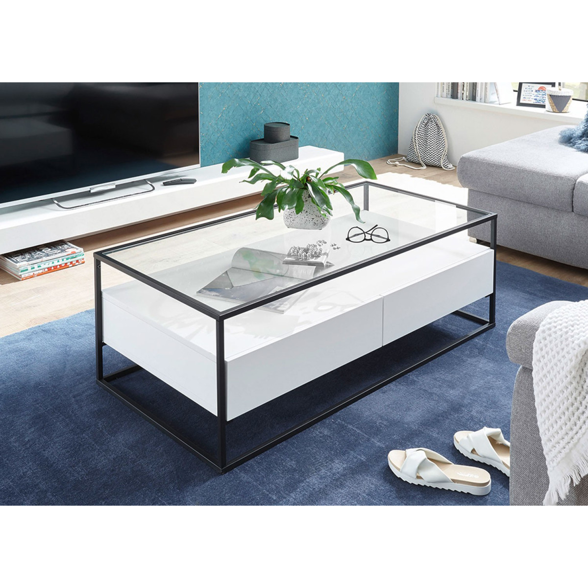 Table basse blanche rectangulaire avec plateau en verre