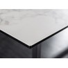 Table de salle à manger céramique blanc aspect marbre et piétement métal
