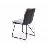Chaise design simili cuir noir et tissu gris clair