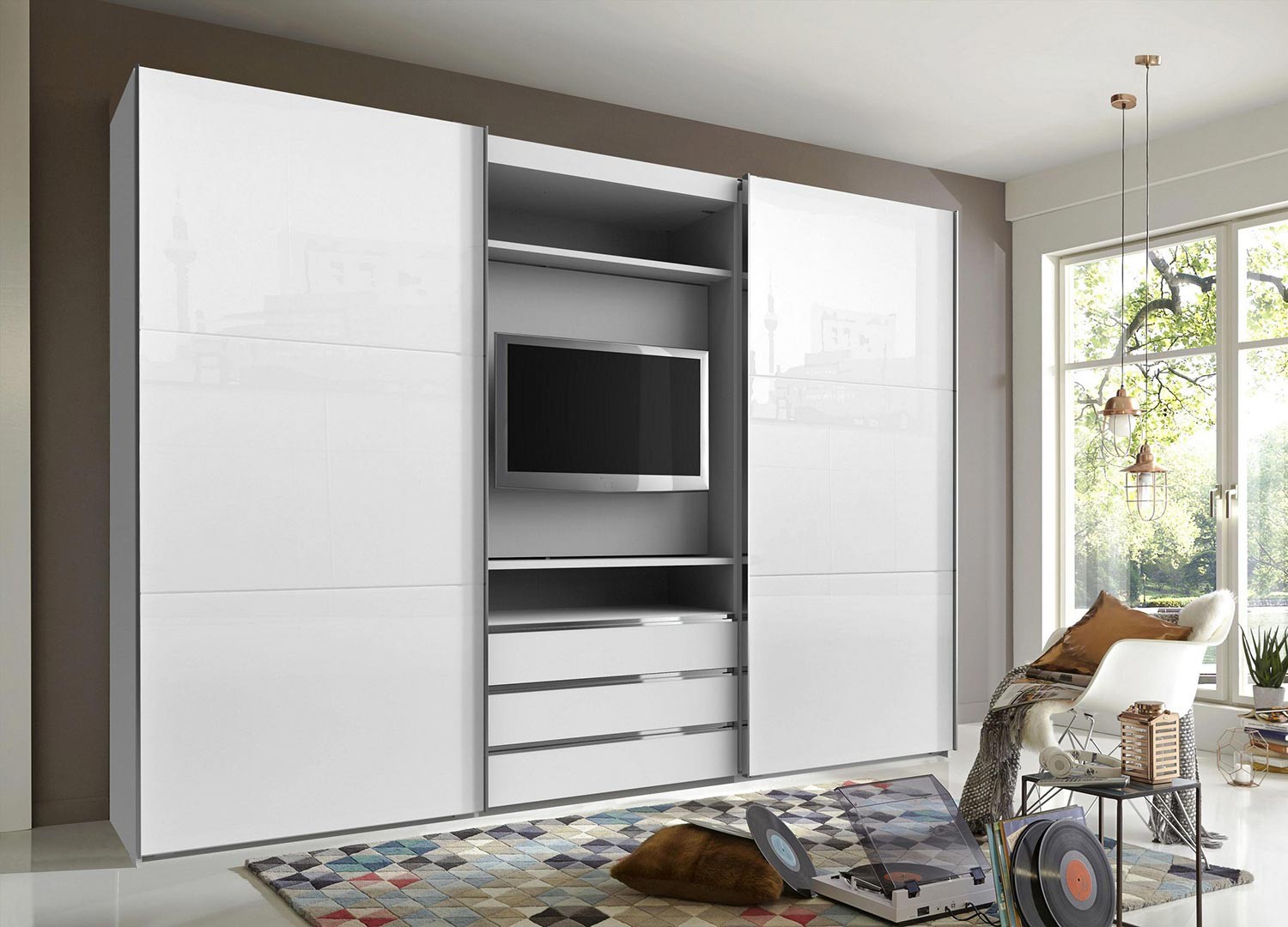 Armoire à portes coulissantes avec élément TV