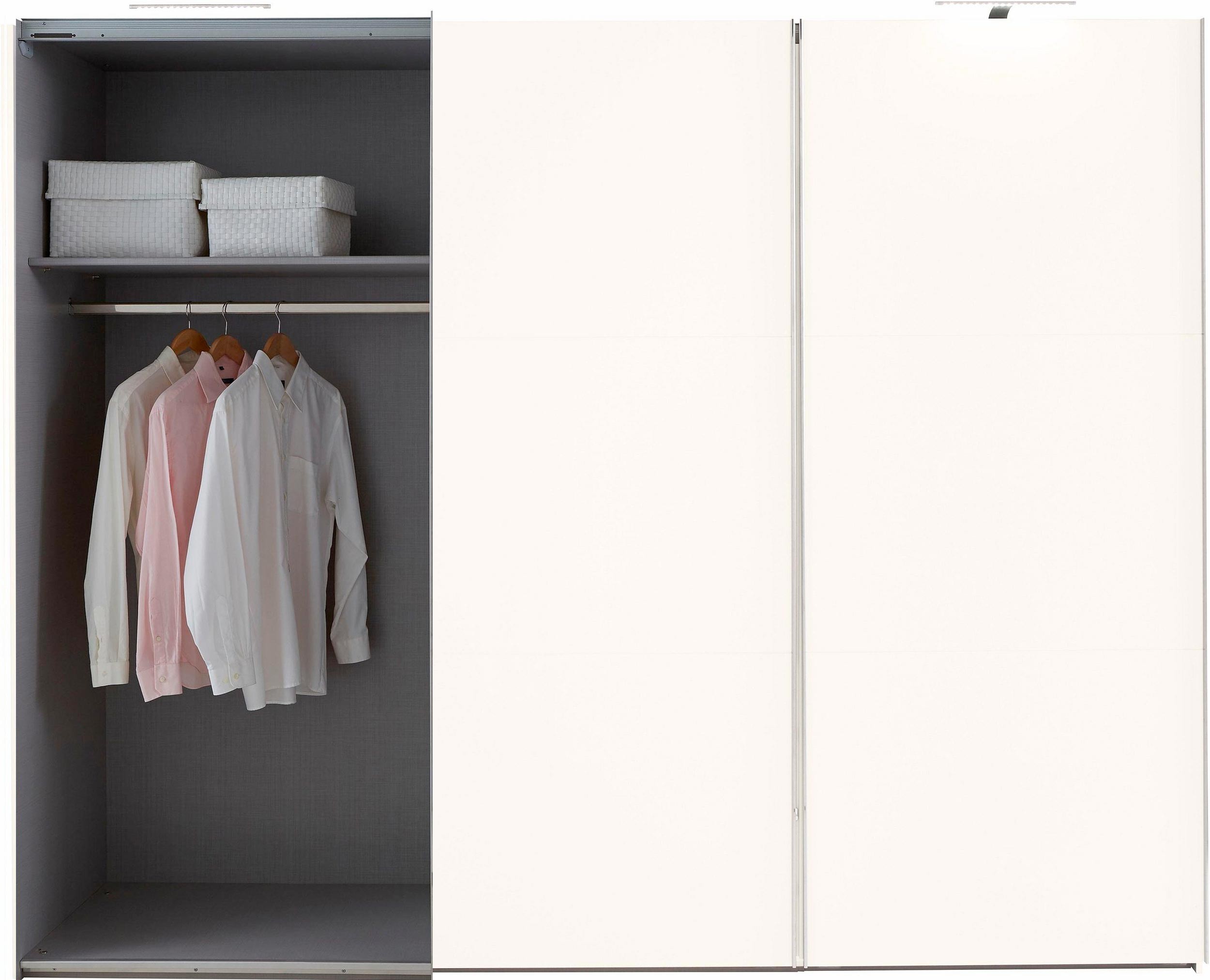 Armoire blanche à portes coulissantes avec élément TV