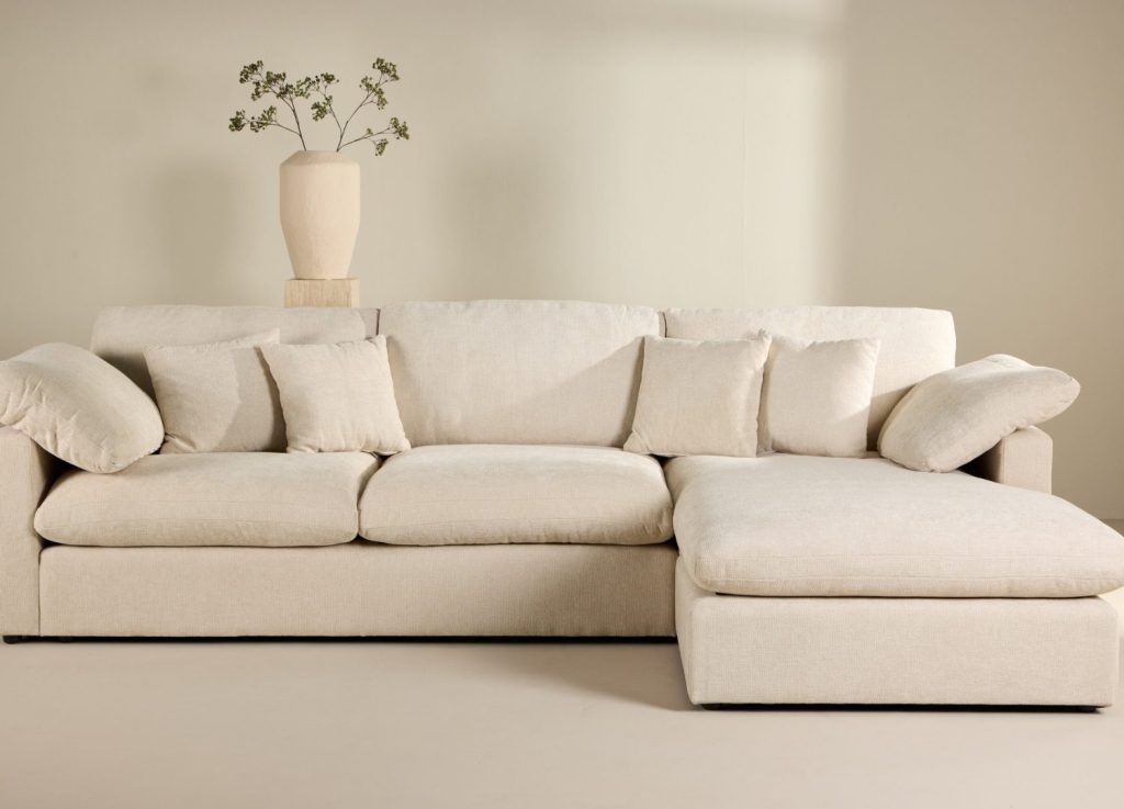 Canapé d'angle Amalfi tissu beige angle réversible cm mis en scène dans un salon