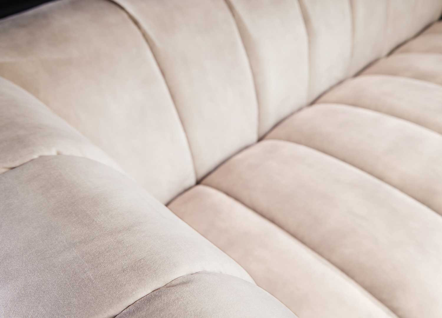 Canapé tissu velours matelassé champagne