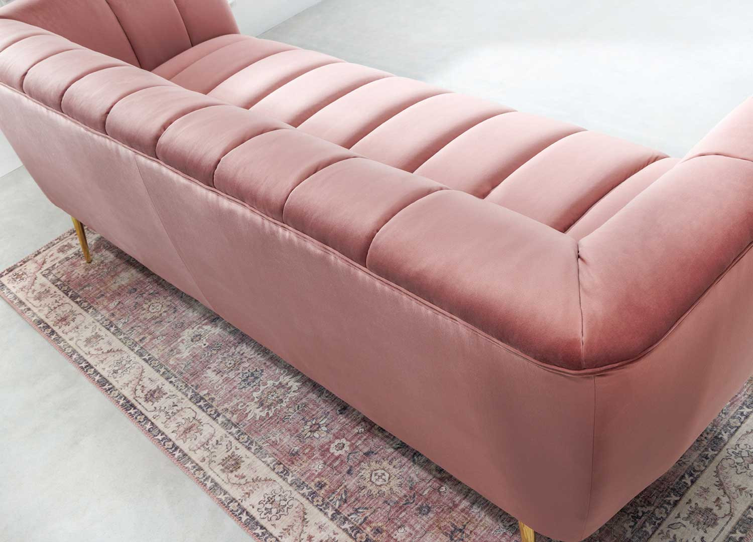 Canapé tissu velours matelassé rose