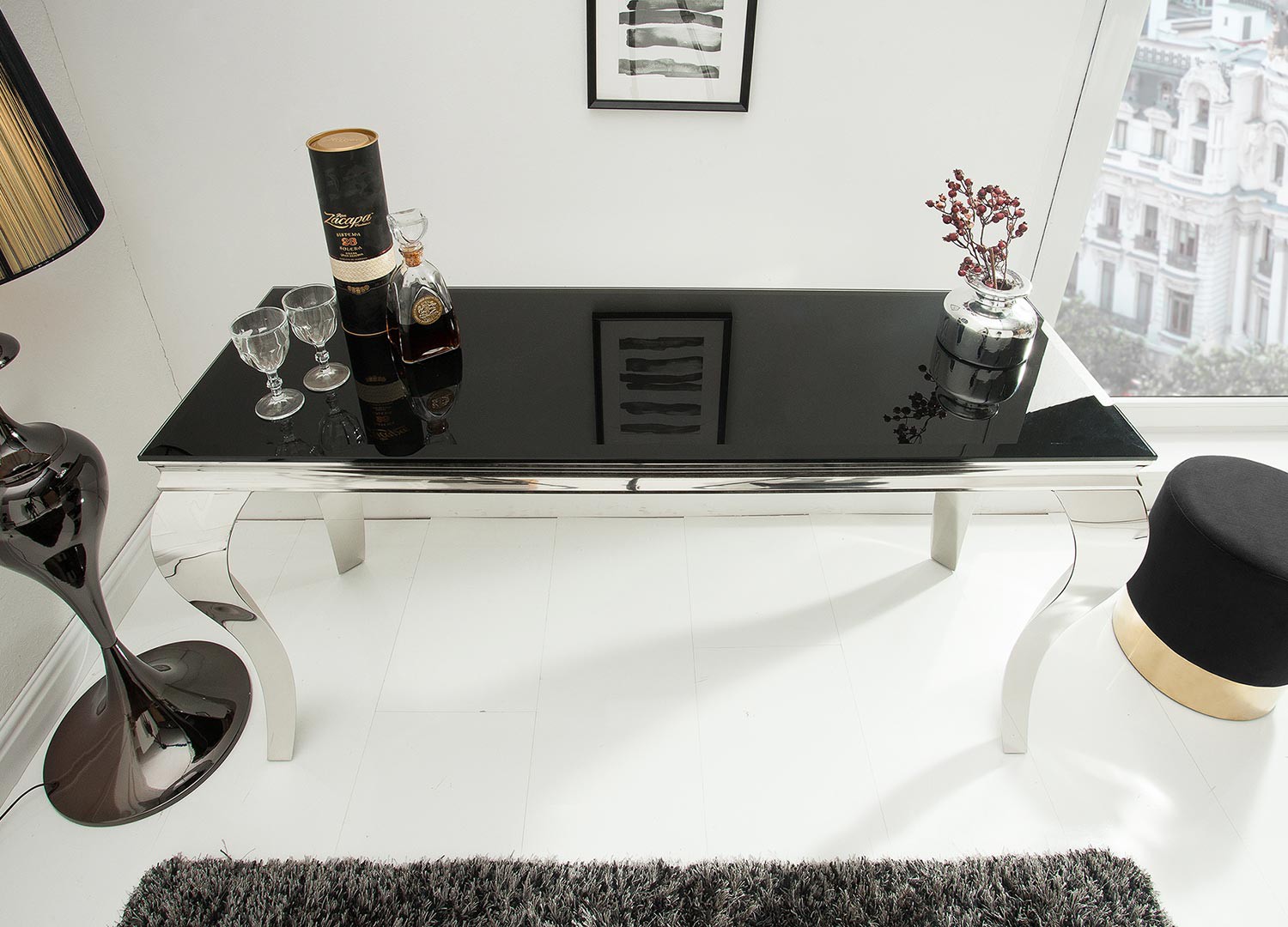 Console moderne baroque verre opale noir et pied en acier poli