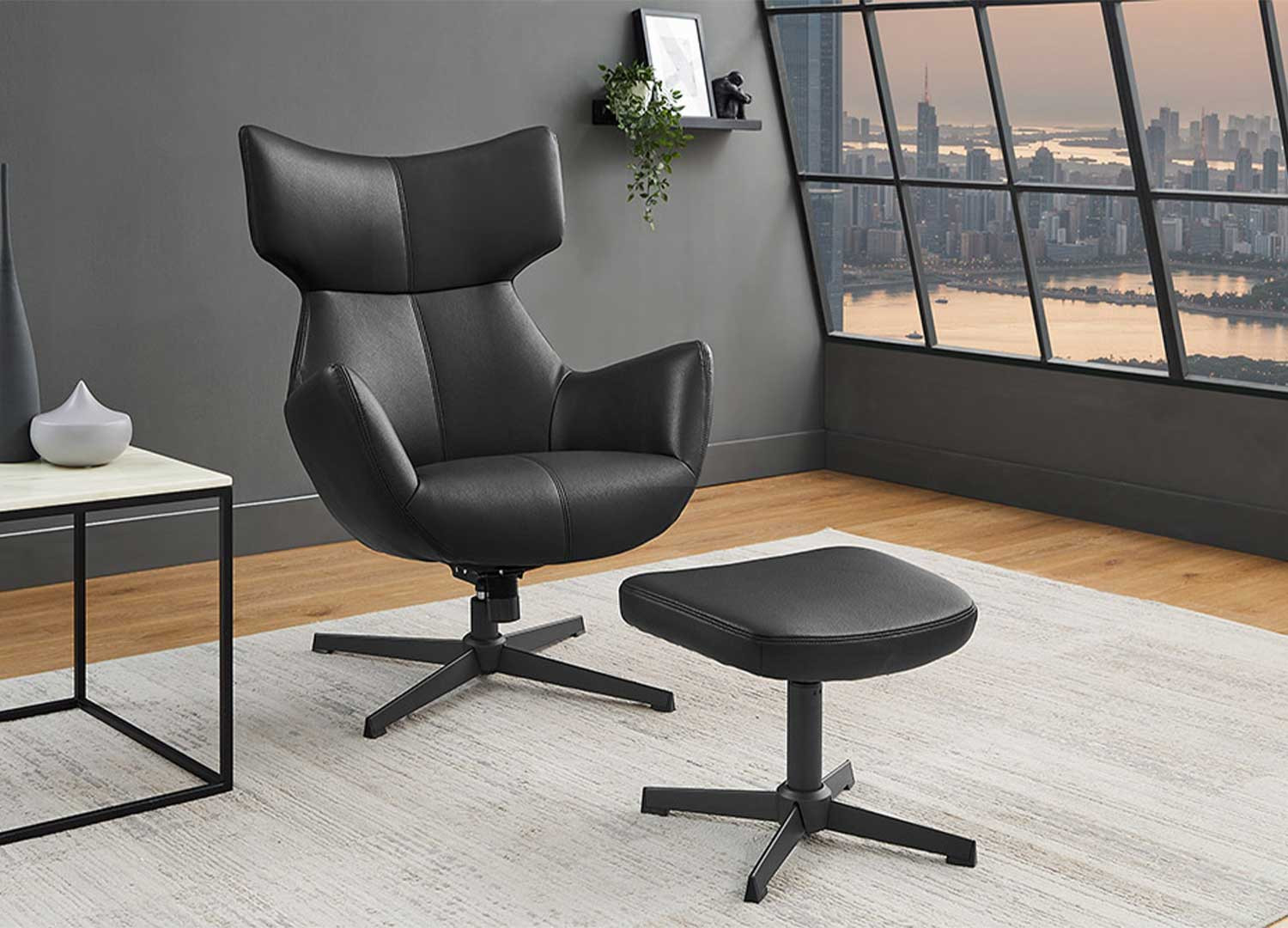 Fauteuil à oreilles pivotant simili cuir noir Jade