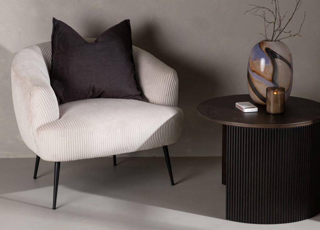 Fauteuil beige en tissu velours côtelé