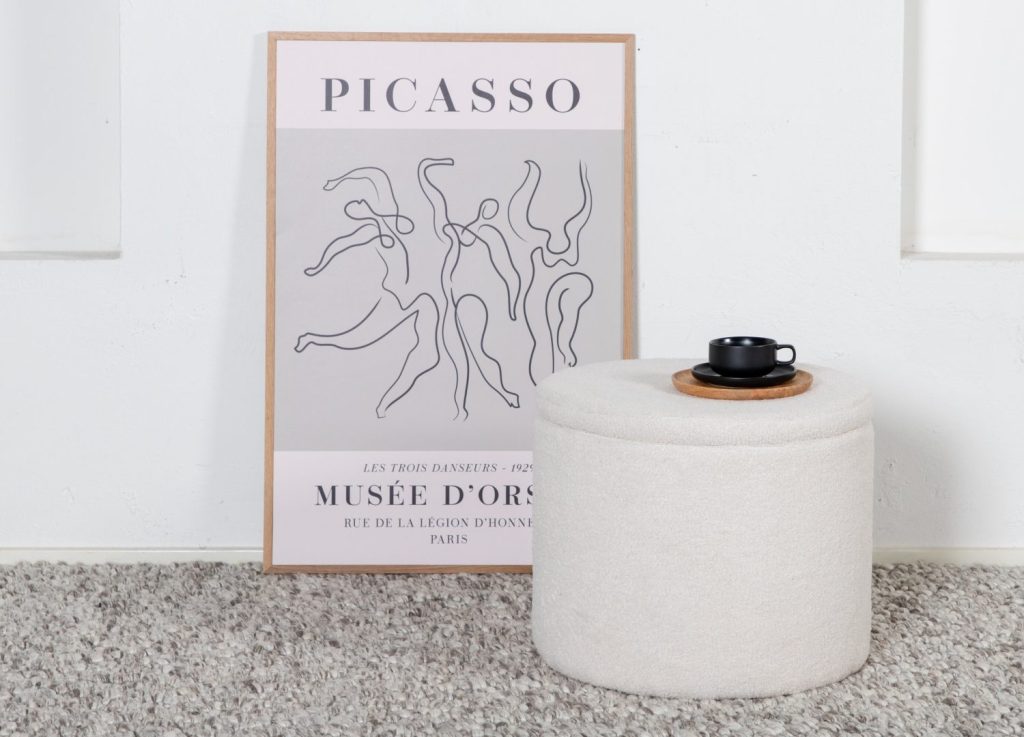 Pouf Dunken tissu bouclette en polyester blanc Ø 51 cm mis en scène dans un intérieur