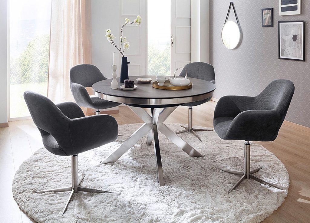 Table à manger ronde céramique anthracite et pied acier brossé