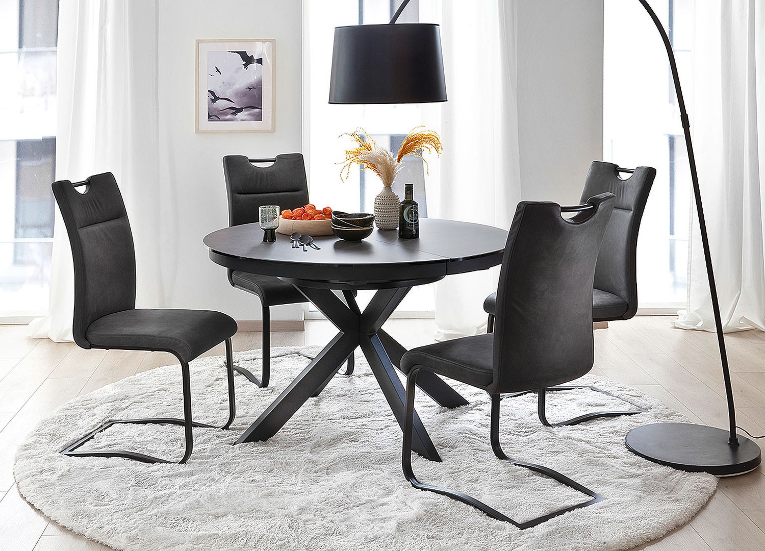 Table à manger ronde céramique anthracite et pied acier noir