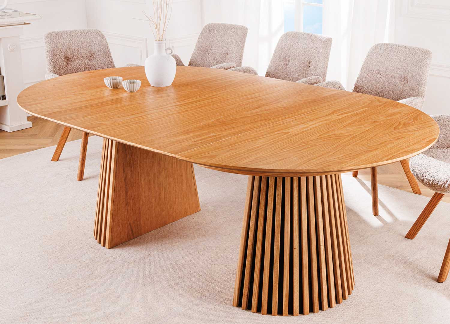 Table à manger ronde extensible en bois couleur chêne naturel