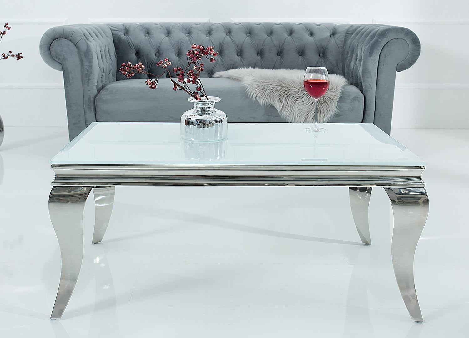 Table basse baroque verre opale blanc et pied en acier poli