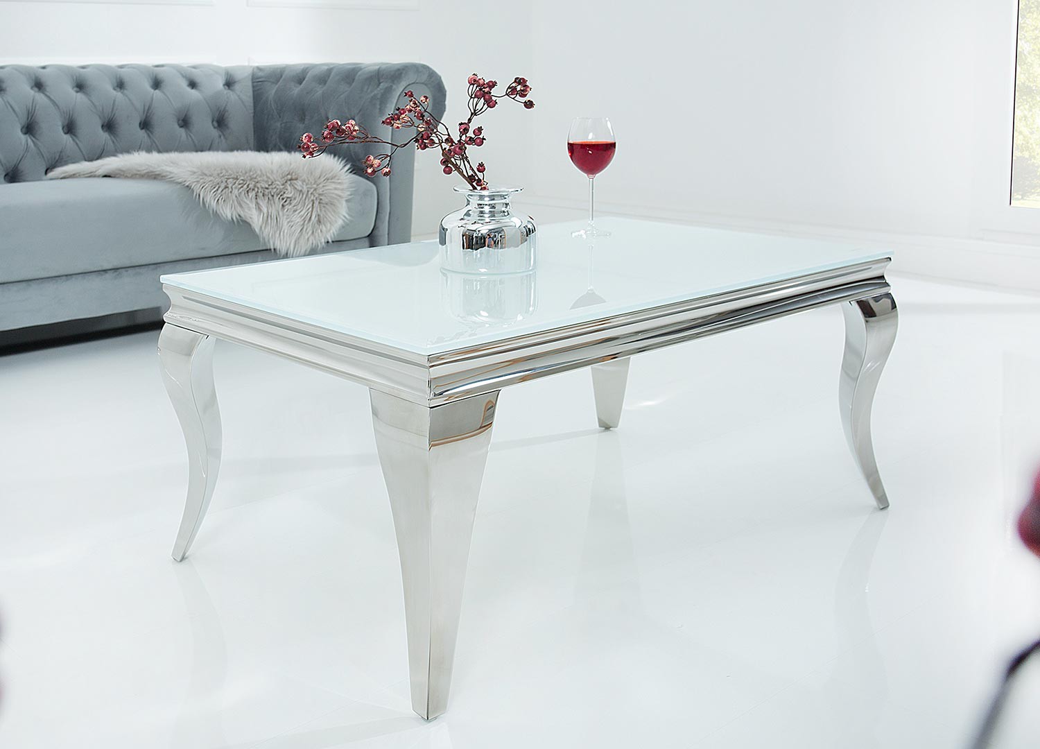 Table basse baroque verre opale blanc et pied en acier poli