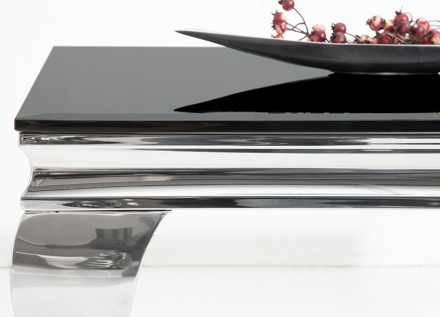 Table basse baroque verre opale noir et pied en acier poli