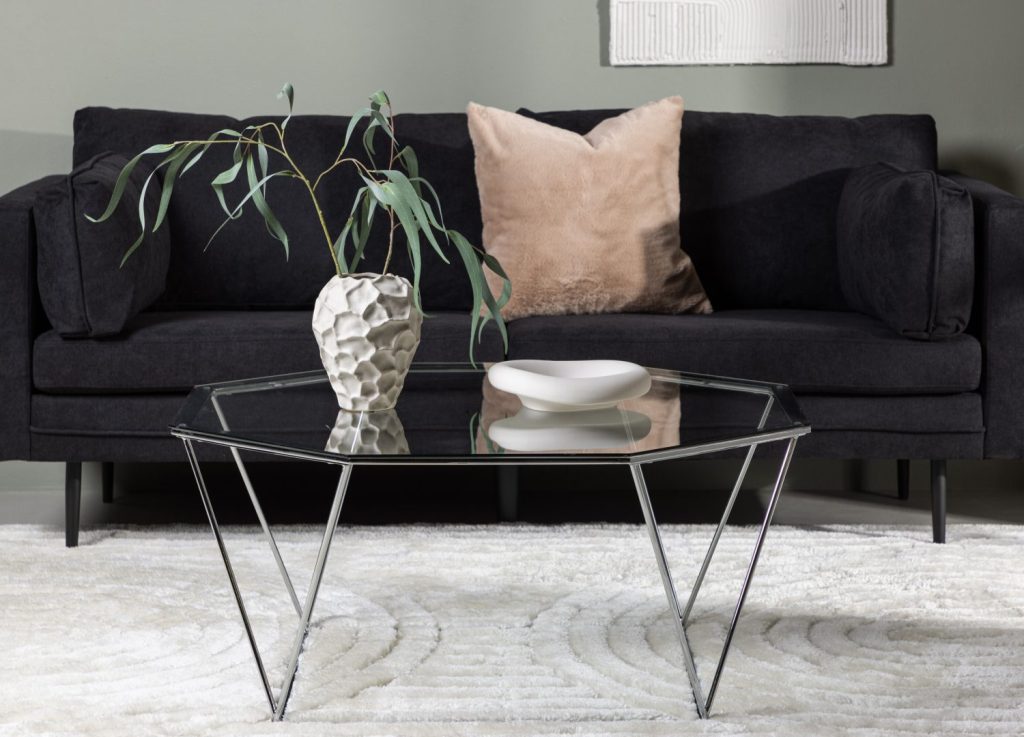 Table basse Österlen transparent dans un salon contemporain