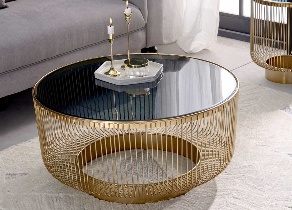 Table basse ronde verre noir et métal doré