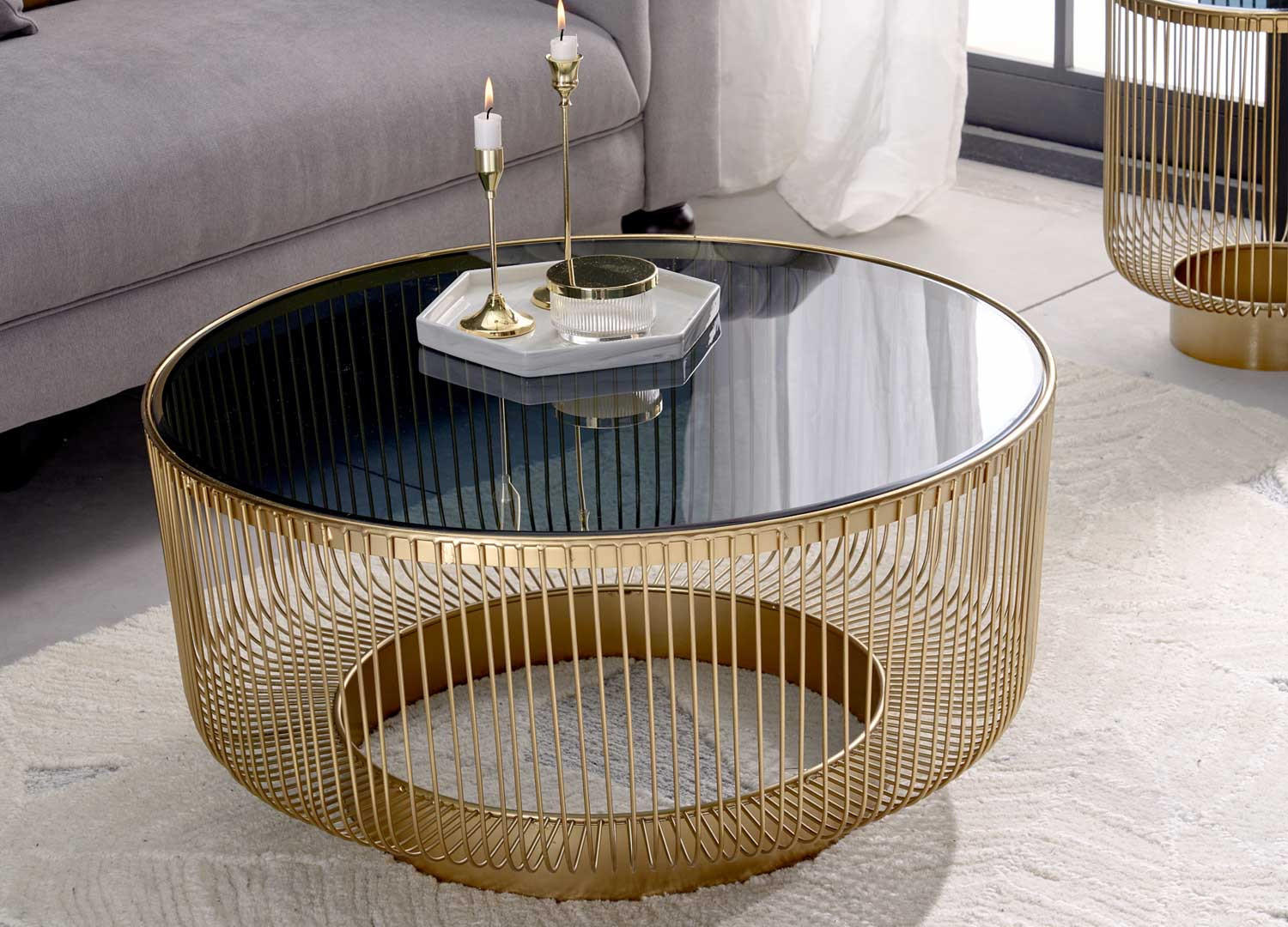 Table basse ronde verre noir et métal doré