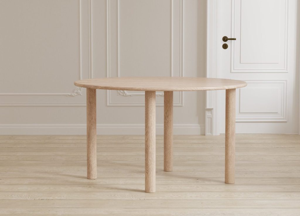 Table à manger ovale Hilo naturel mise en scène dans une salle à manger